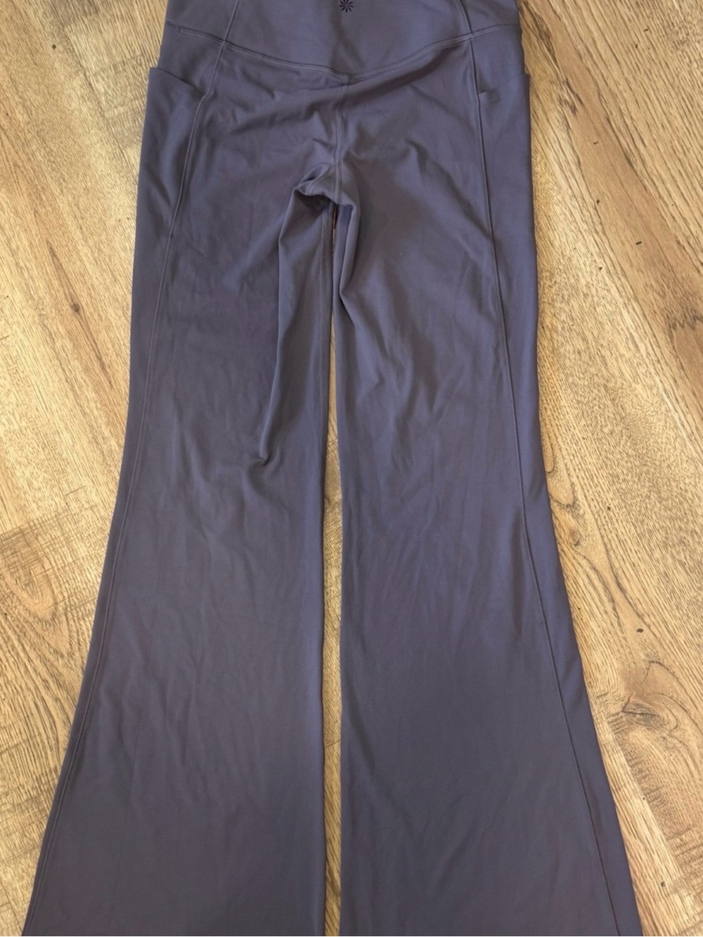 Athleta Salutation Stash Flare Pant in Dark Plum